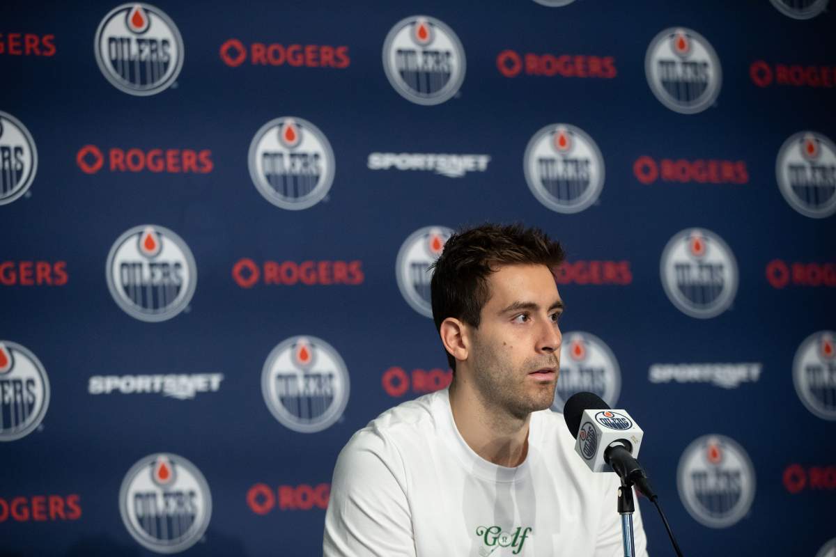 Edmonton Oilers Evan Bouchard (2) speaks to media after losing to the Florida Panthers during Game 6 of the NHL Stanley Cup final in Edmonton, Thursday, June 19, 2025.