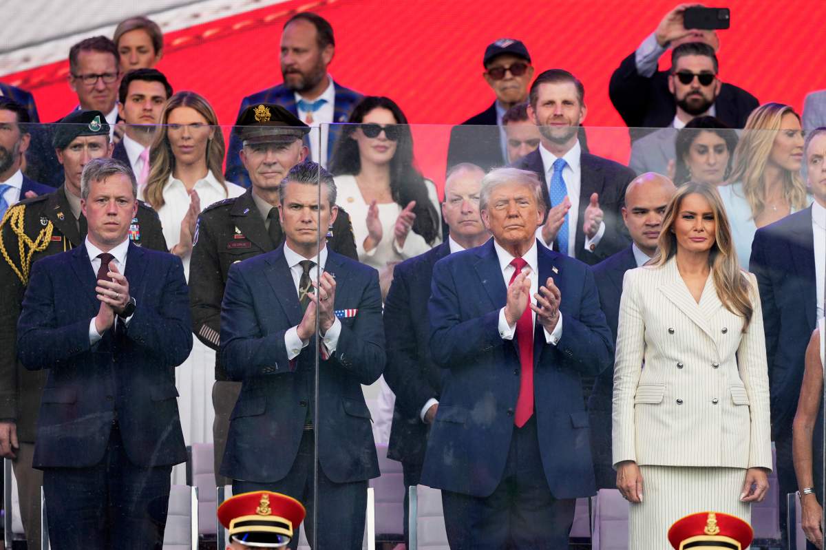 President Donald Trump, first lady Melania Trump, Secretary of the Army Daniel Driscoll and Defense Secretary Pete Hegseth attend a military parade commemorating the Army’s 250th anniversary, coinciding with his 79th birthday, Saturday, June 14, 2025, in Washington. (AP Photo/Julia Demaree Nikhinson)