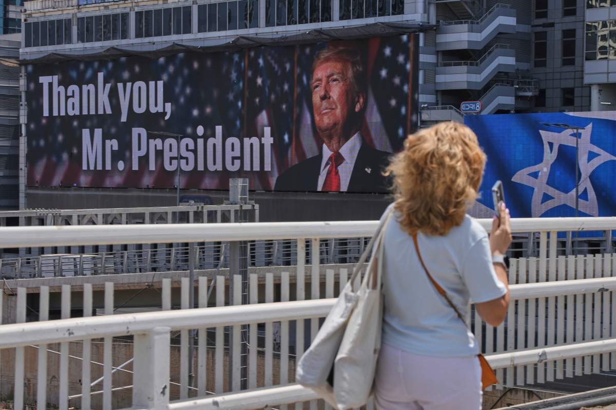 An electronic billboard beams an image of President Donald Trump alongside the message "Thank you, Mr. President" referring to the U.S. involvement in the war between Israel and Iran, in Ramat Gan, Israel, Sunday, June 22, 2025.