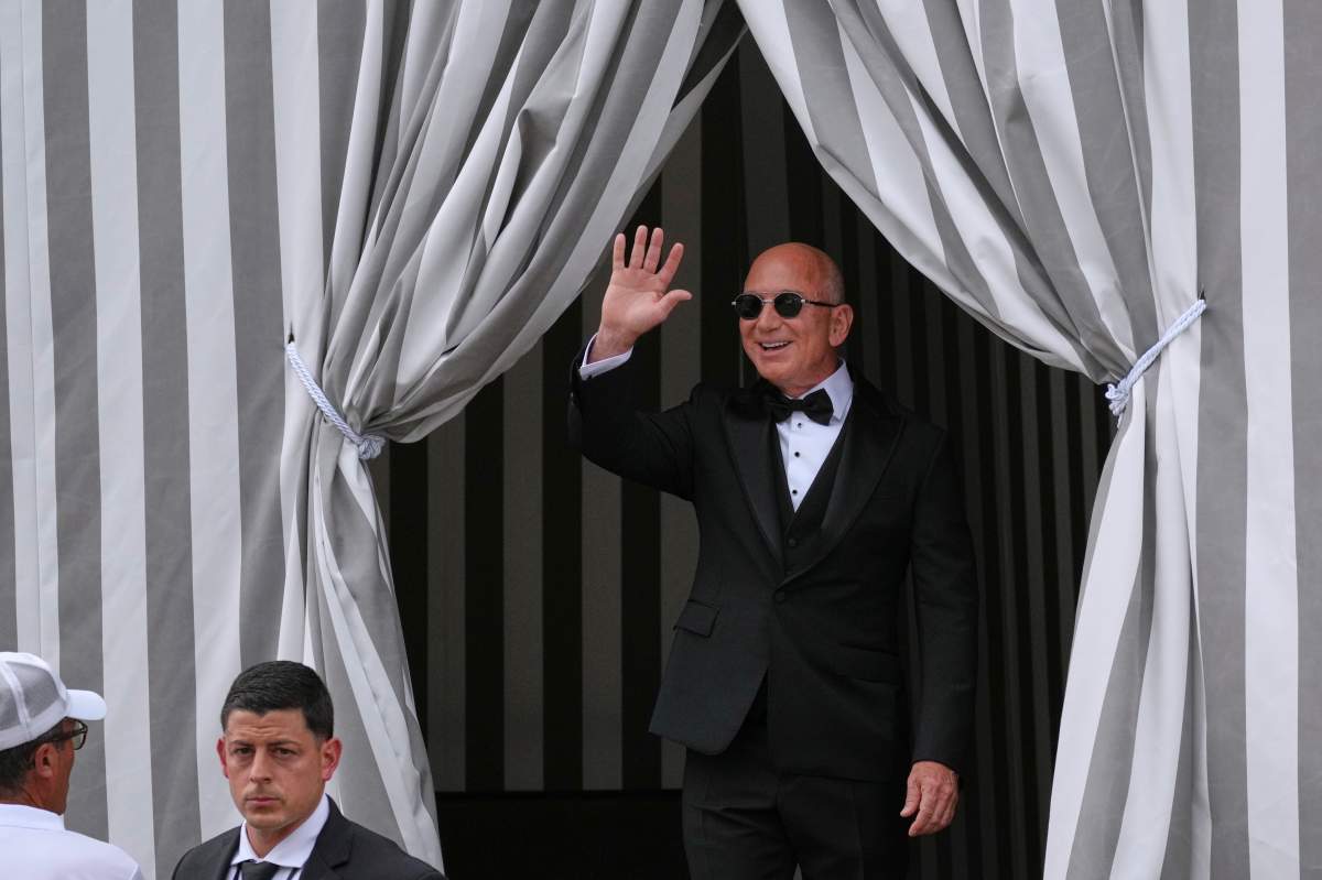 Jeff Bezos leaves a hotel ahead of the anticipated wedding celebrations with Lauren Sanchez, in Venice, Italy, Friday, June 27, 2025.