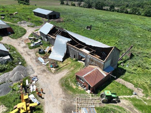 Drone photo of a barn with partial roof loss on the west wide of Danville.