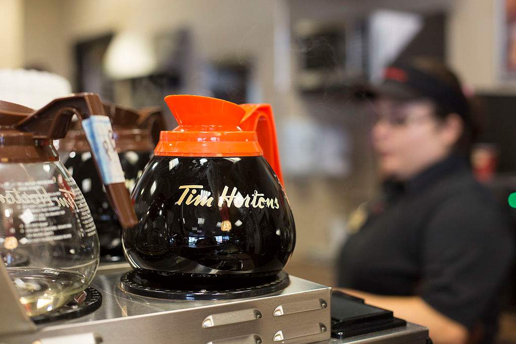 A coffee pot sits on a burner at a Tim Hortons Inc. restaurant in Oakville, Ontario, Canada.