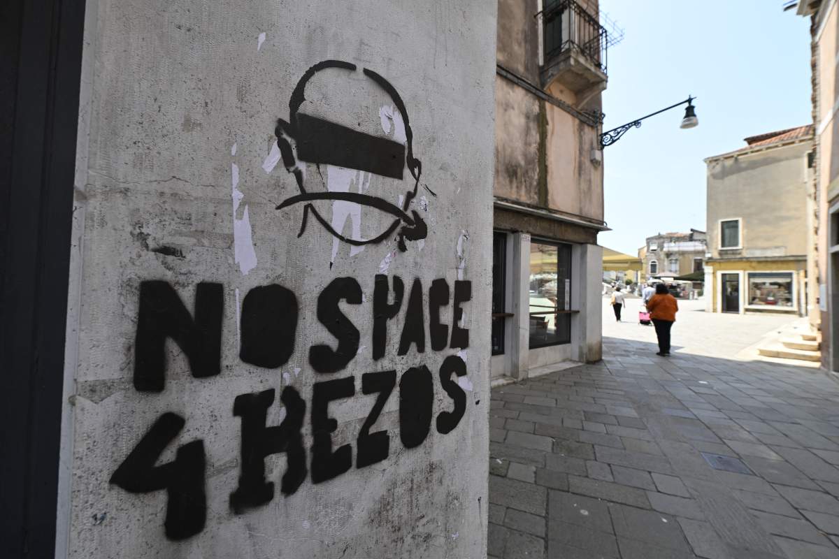 A graffiti reading "No Space for Bezos" is pictured in a bar of Venice where the billionaire Jeff Bezos will marry is fiancee, journalist Lauren Sanchez at the end of the month, on June 13, 2025.