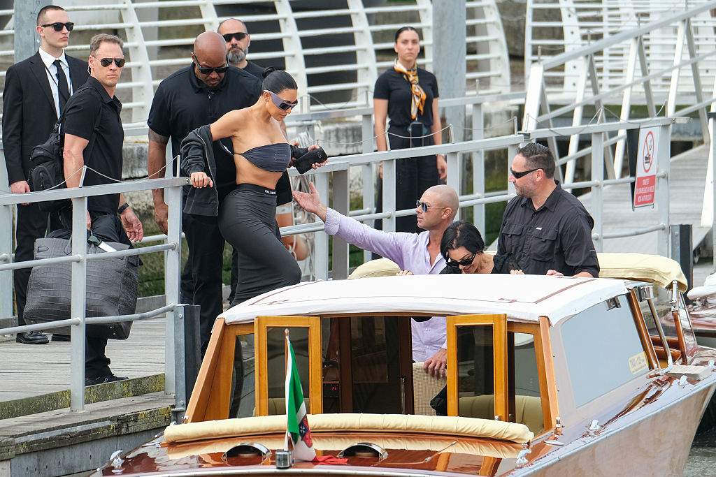 Kim Kardashian arrives at Marco Polo Airport for the Jeff Bezos and Lauren Sanchez Wedding on June 26, 2025 in Venice, Italy.