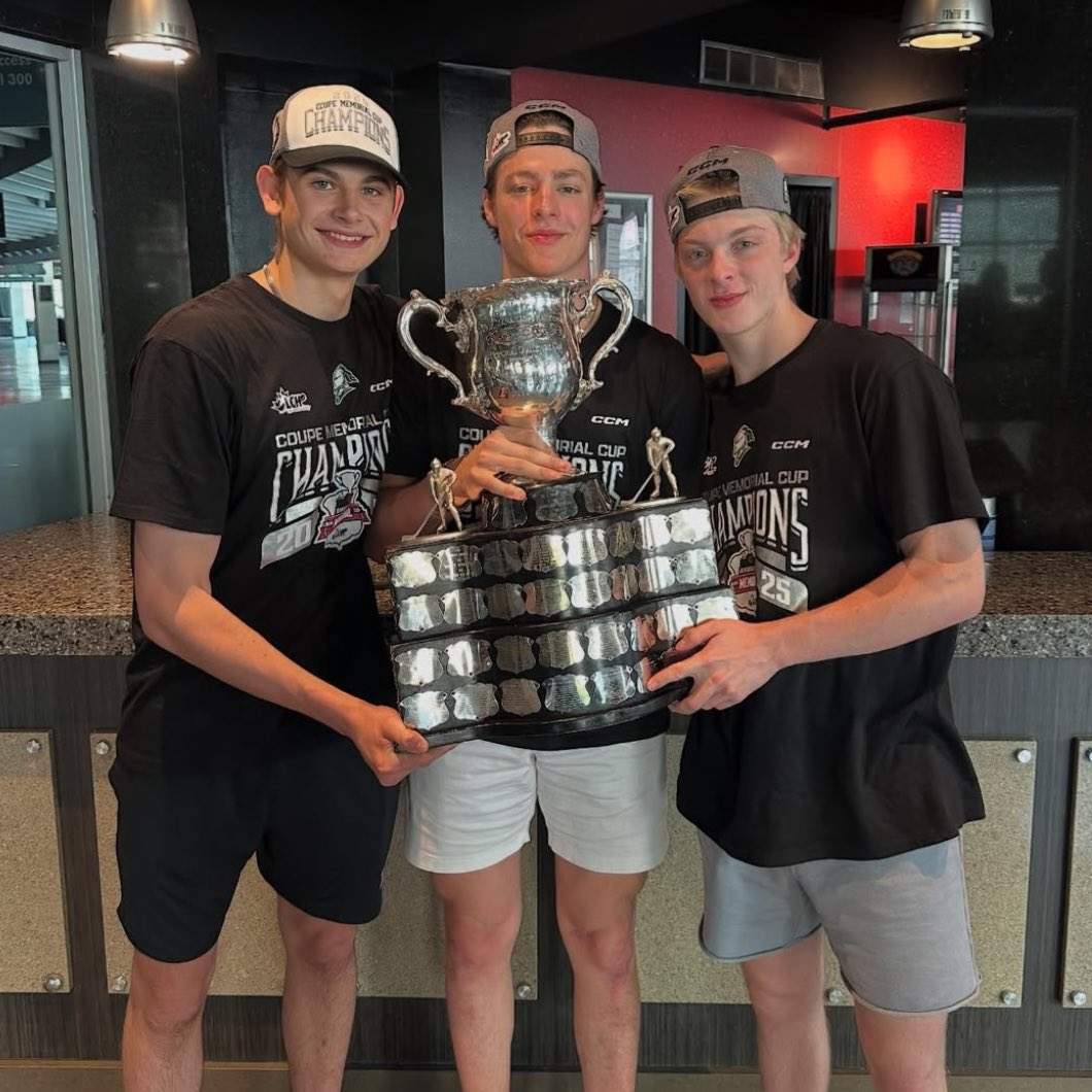 (Left to right) Aleksei Medvedev, Henry Brzustewicz and Noah Read of the London Knights hold the Memorial Cup.