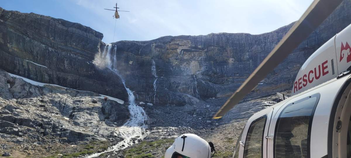 A helicopter at the rock slide site near Bow Lake on Friday, June 20, 2025.