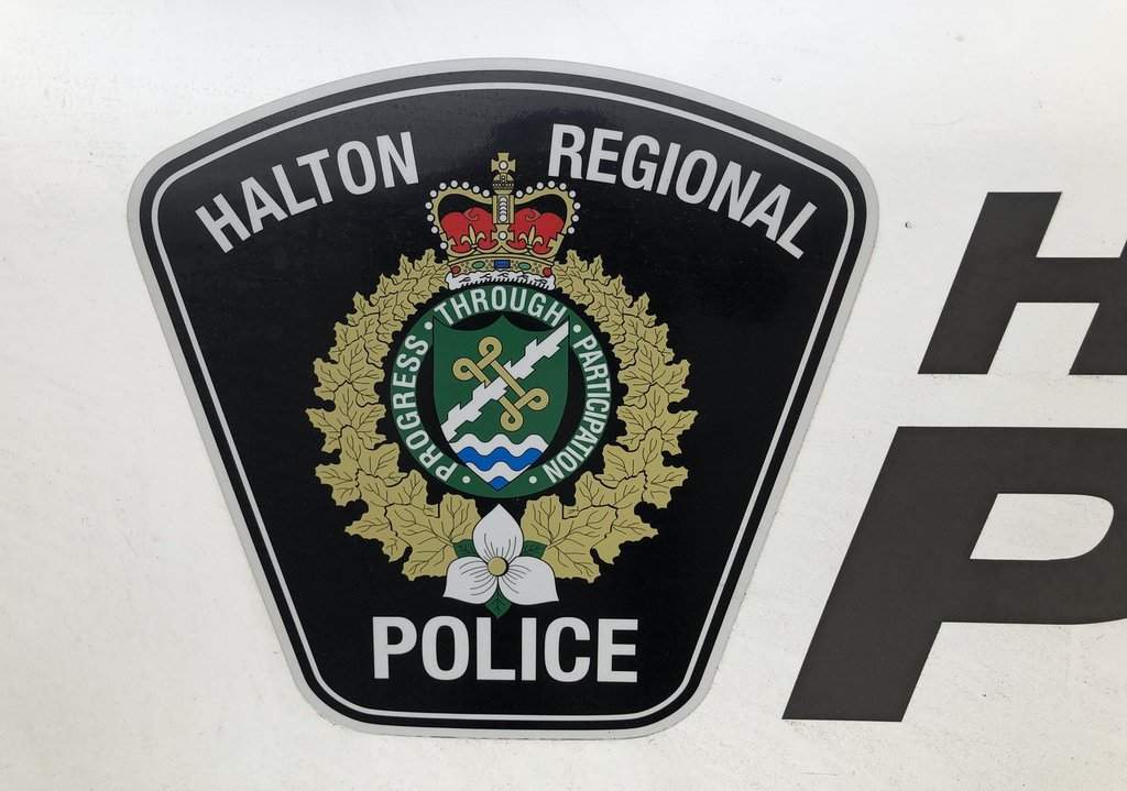 A Halton Regional Police logo is shown on a vehicle in Oakville, Ont., Wednesday, Jan.18, 2023. THE CANADIAN PRESS/Richard Buchan.