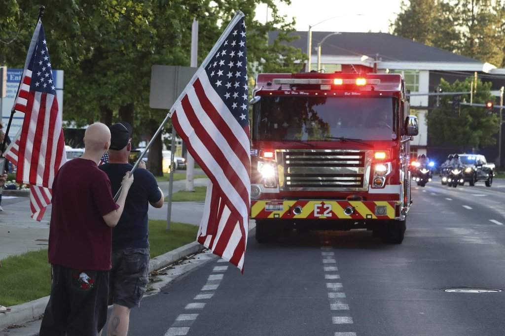 A procession from Kootenai Health headed to Spokane after a few firefighters were killed Sunday, June 29, 2025.