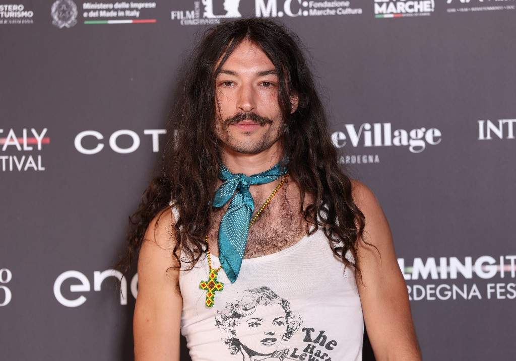 Ezra Miller attends Filming Italy 2025 - Press Conference on June 19, 2025 in Cagliari, Italy.