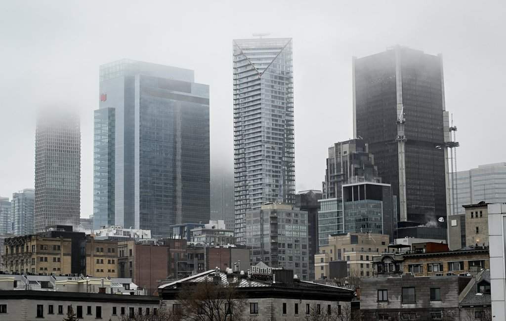 Fog hangs over the skyline of Montreal on Jan. 1, 2025.