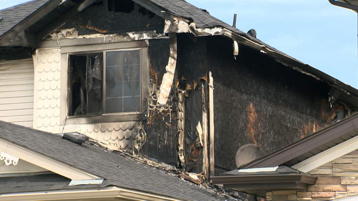 Neighbours said there were six people living in the home. A family of four on the main floor and two others in the basement.