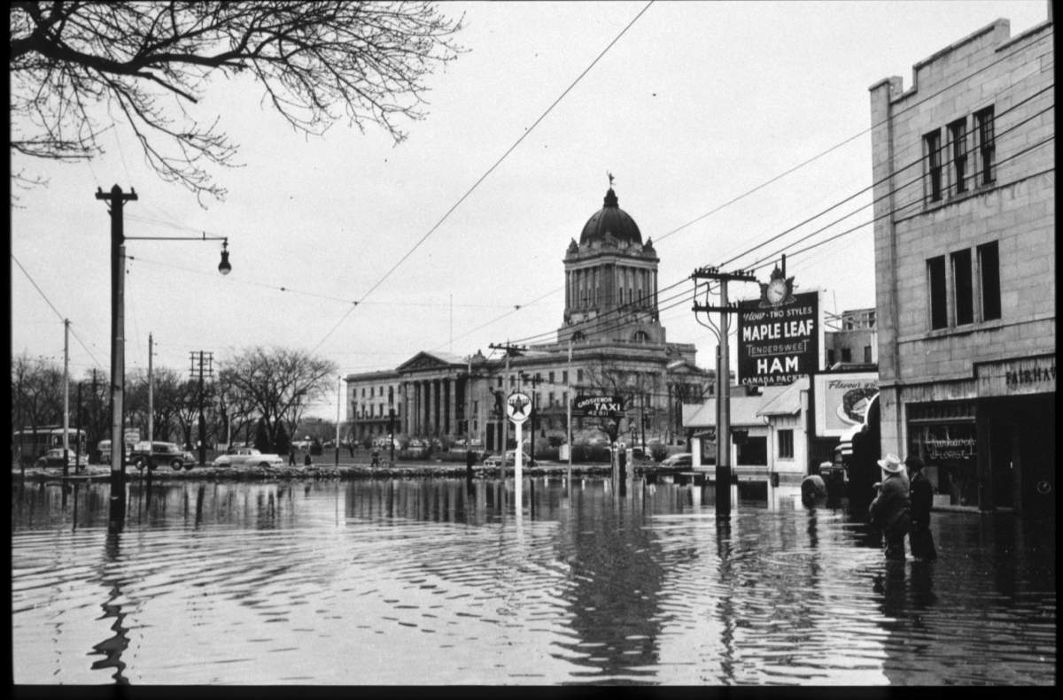 Flooded downtown Winnipeg streets near the Manitoba legislative building.
