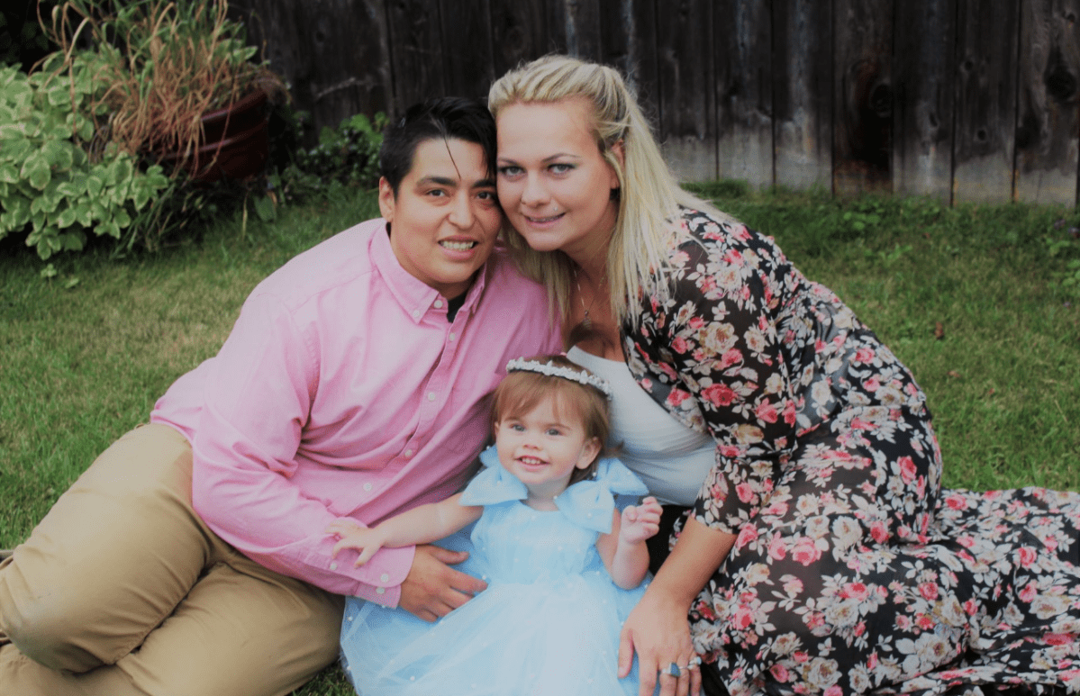 Miranda Sharp, her fiancé Ashton Wilson and their daughter Charlize. 