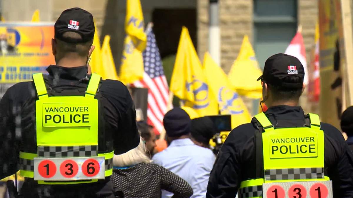While police said Monday's noisy protest was peaceful, officers could also be seen keeping a close eye on those involved.