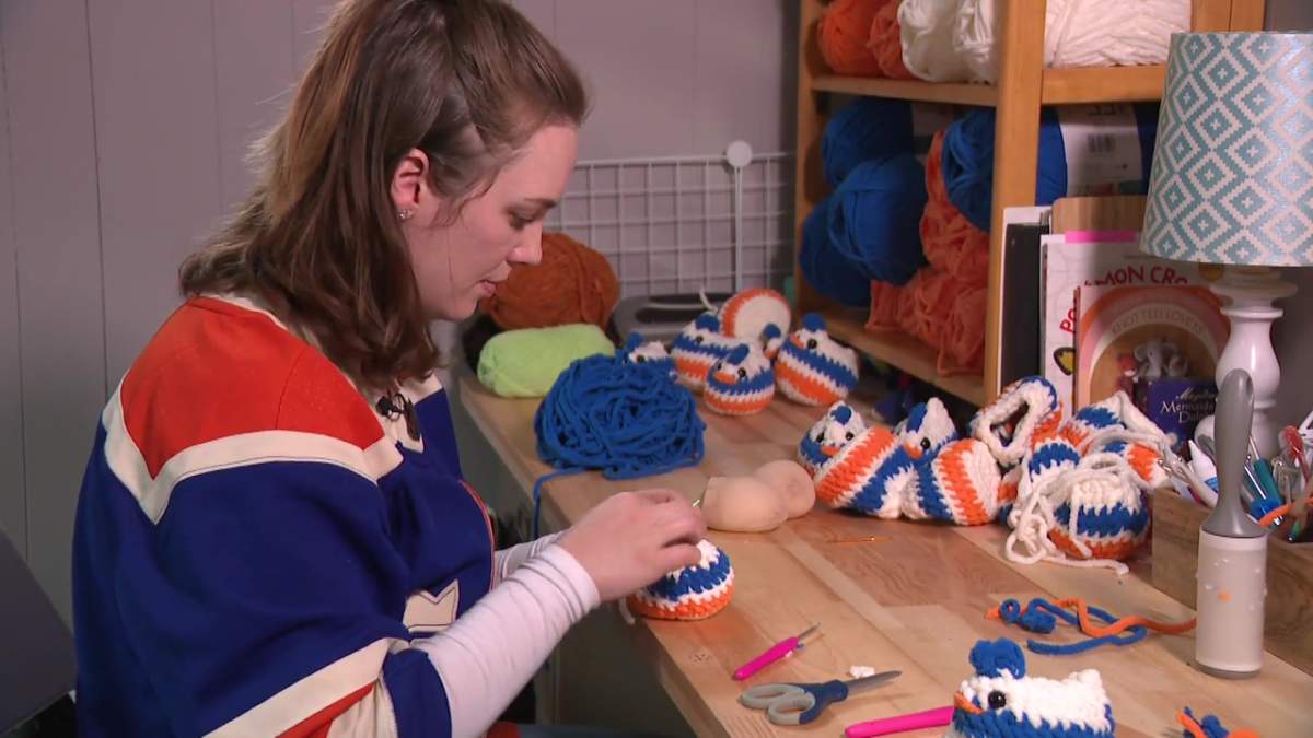 Crafter Ashley Sinclair croches Edmonton Oilers-themed emotional support chickens.