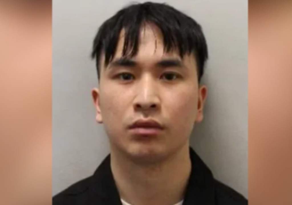 A handout photo issued by the Metropolitan Police of PhD student Zhenhao Zou.