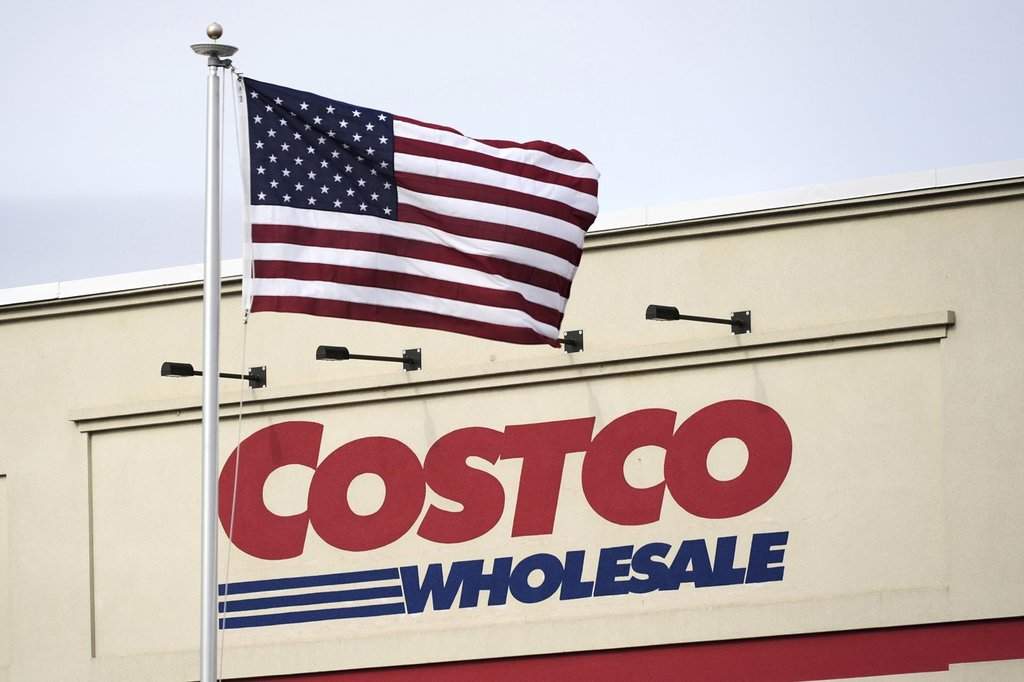 FILE - An American flag flies outside a Costco Warehouse in Cranberry, Pa., on March 7, 2025. (AP Photo/Gene J. Puskar, File).
