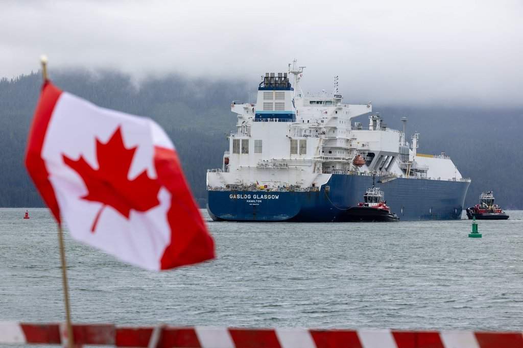 A tanker loaded with the first cargo of Canadian liquefied natural gas departs from Kitimat, B.C. in this Monday, June 30, 2025 photo provided by LNG Canada.