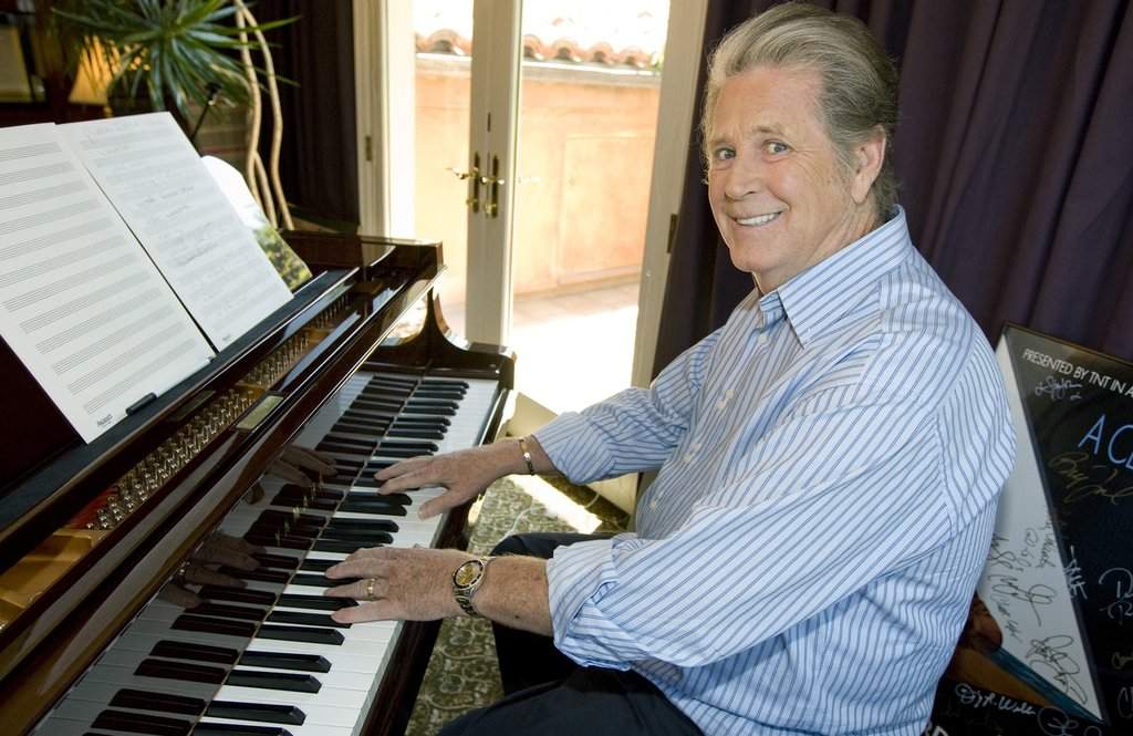 FILE - Musician Brian Wilson poses for a portrait at his home in Los Angeles on Monday, July 28, 2008.