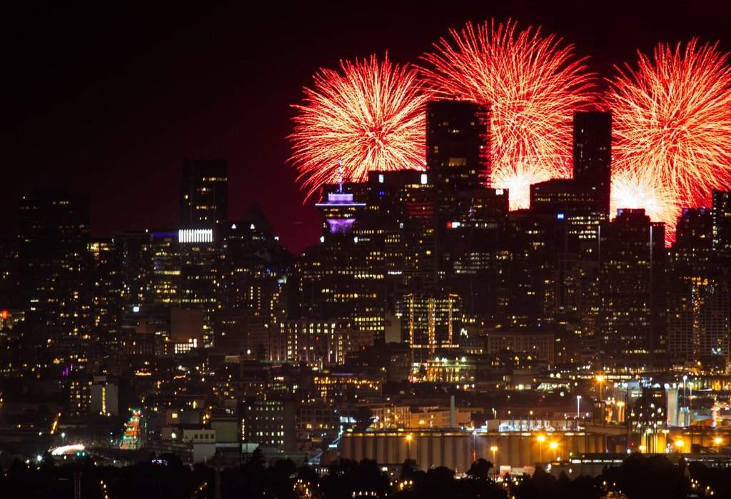 Seen from Burnaby Mountain approximately 16 kilometres away, fireworks explode behind the downtown Vancouver skyline as a pyrotechnic team from Croatia closes out the final night of the Honda Celebration of Light, in Vancouver, on Saturday Aug. 3, 2019. 