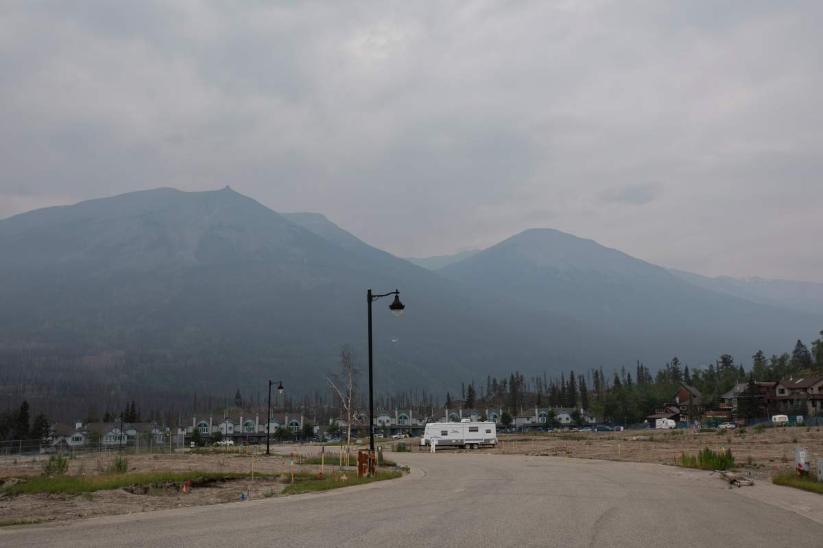 A trailer home on an empty lot is seen in one of the most heavily impacted neighbourhoods, roughly one year after the wildfire in Jasper, Alta., on Monday, July 21, 2025.