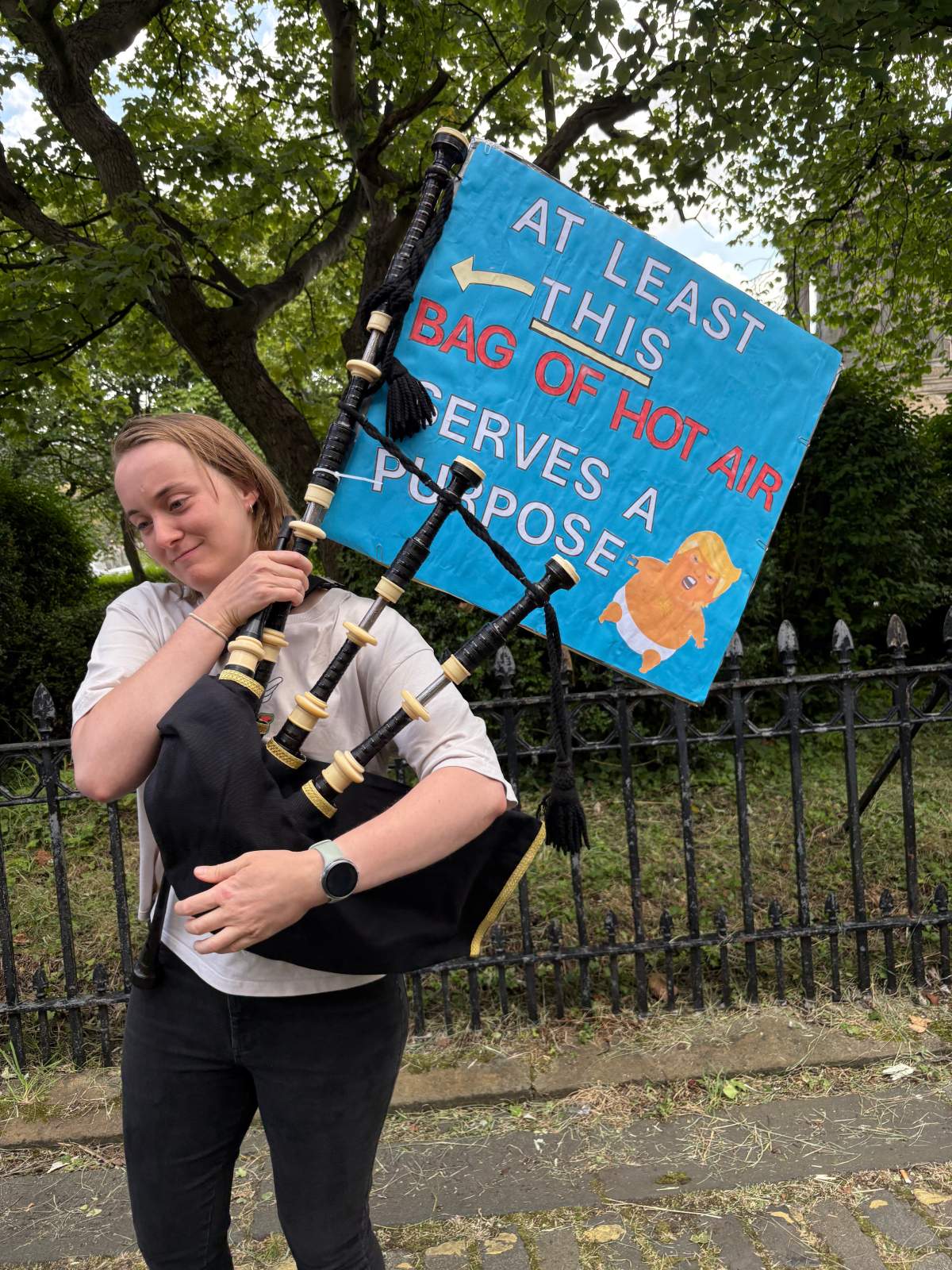 A woman takes part in a Stop Trump Scotland protest in Edinburgh, as US President Donald Trump begins his five-day private trip to the country at his Turnberry golf course in South Ayrshire. Picture date: Saturday July 26, 2025. Photo credit: Neil Pooran/PA Wire