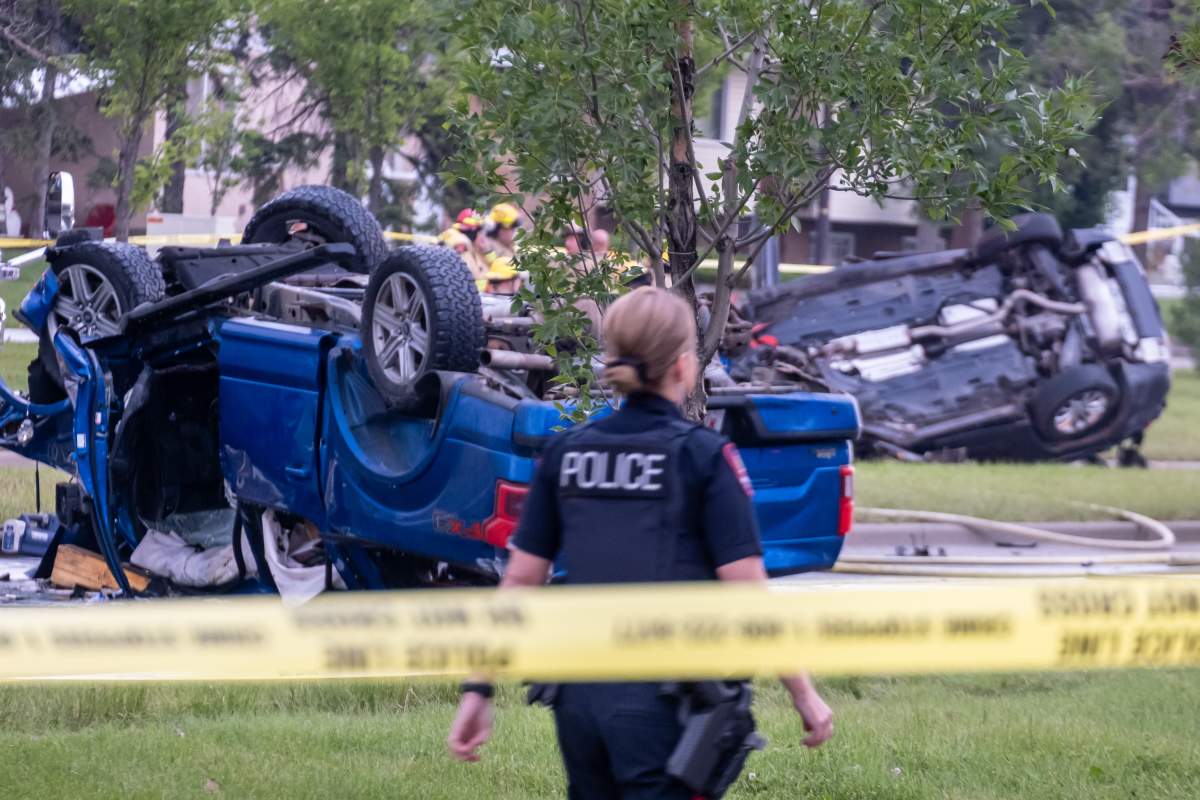 Calgary Police say charges are pending against the driver of the pickup truck who was driving the wrong way when he collided head on with the couple's jeep.