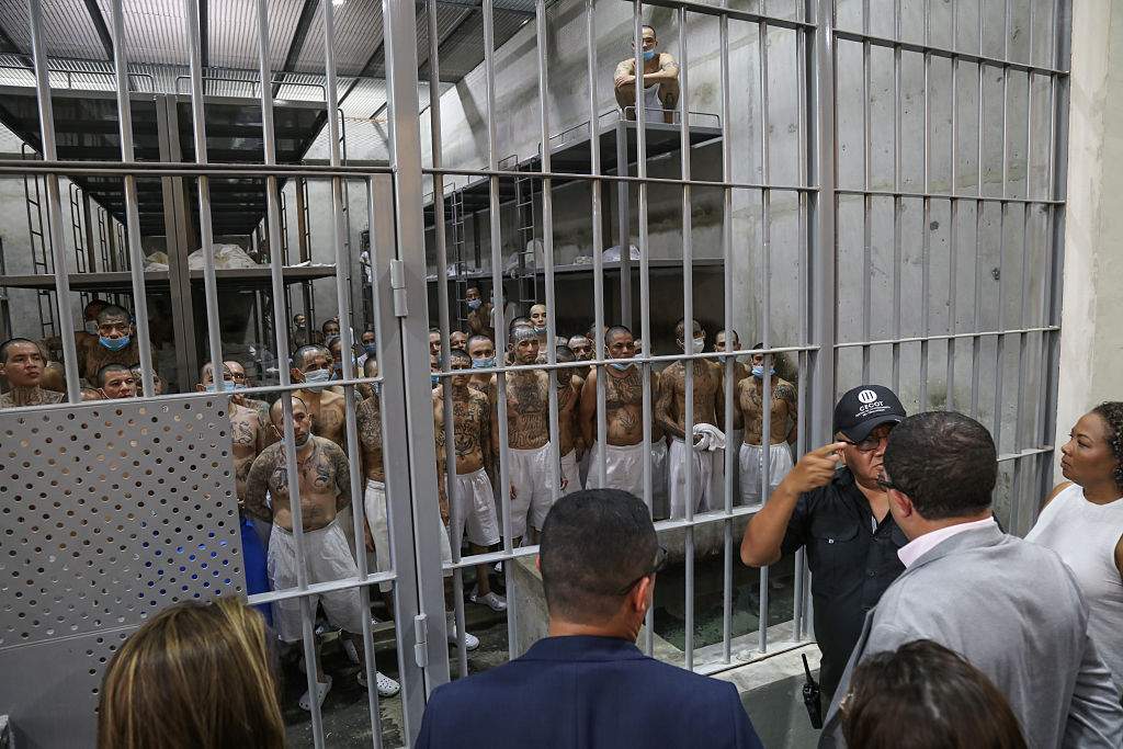 Director Belarmino Garcia explaining gang members' tattoos at the Terrorism Confinement Center (CECOT) in Tecoluca, in San Vicente, El Salvador on April 04, 2025.
