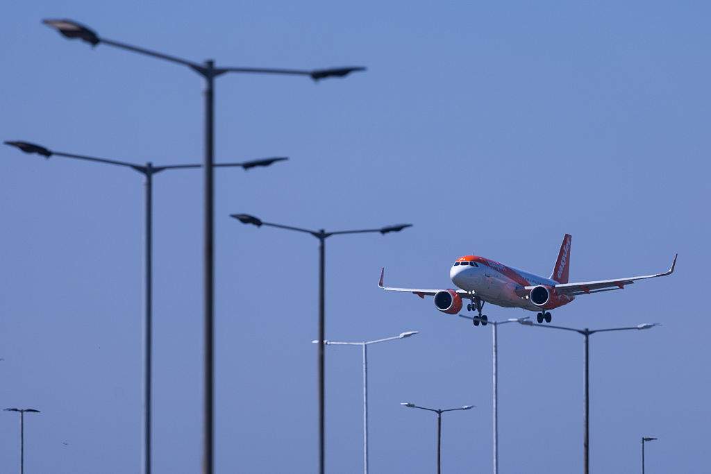 A passenger aircraft, operated by easyJet, makes its final approach to land at London Luton Airport in Luton, U.K., on Tuesday, May 13, 2025.