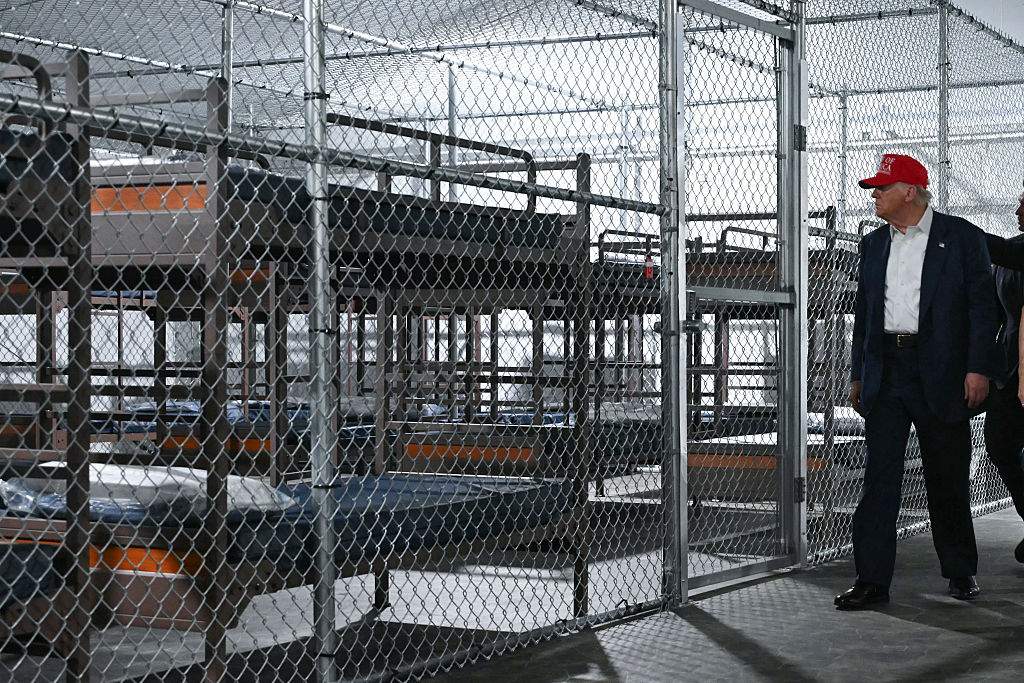 President Donald Trump tours a migrant detention center, dubbed "Alligator Alcatraz," located at the site of the Dade-Collier Training and Transition Airport in Ochopee, Florida on July 1, 2025.