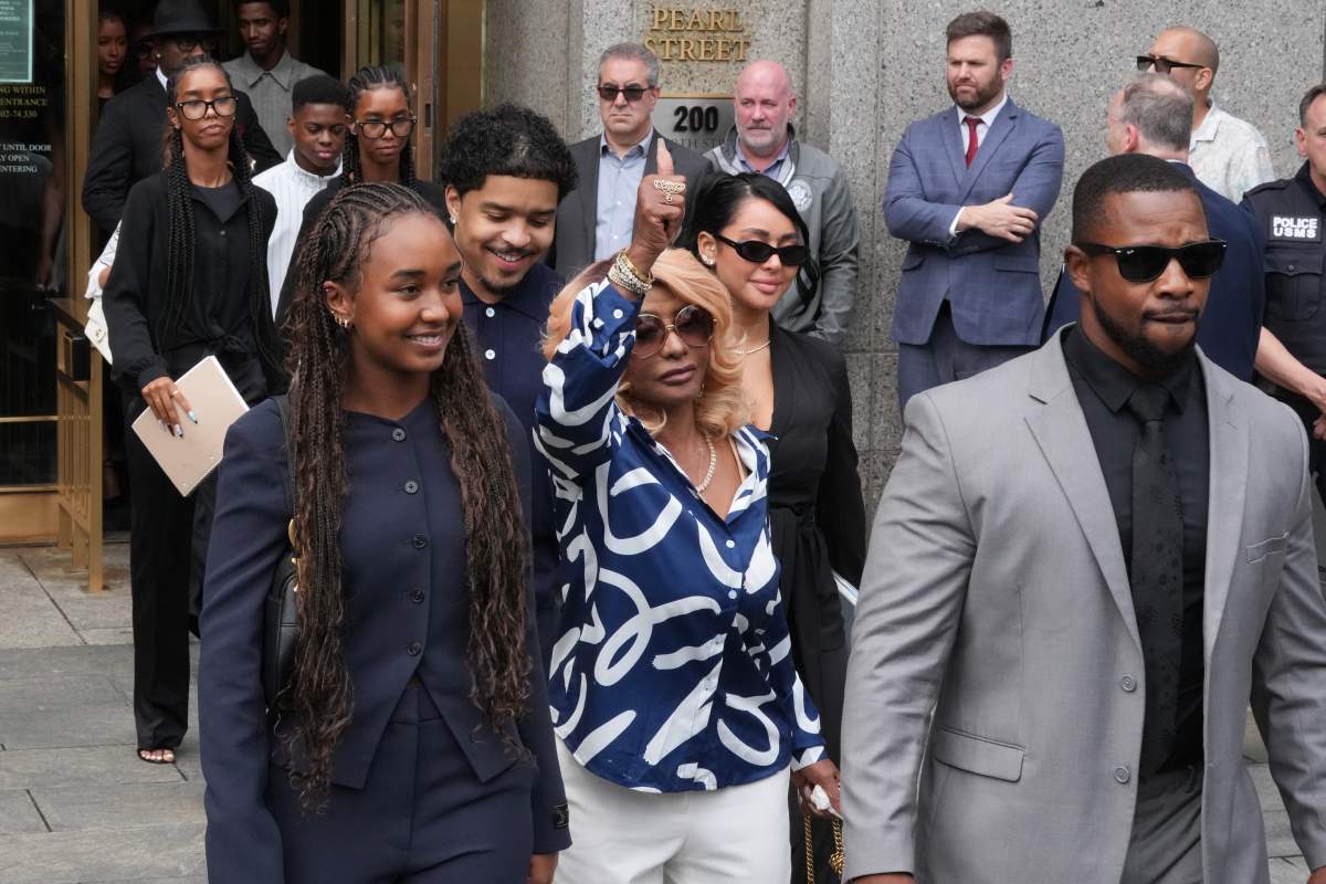 Janice Combs (C), mother of Sean "Diddy" Combs, gives a thumbs up as she departs with her children and family members at Manhattan's Federal Court as jury reached a full verdict in Sean "Diddy" Combs' sex trafficking trial on July 2, 2025, in New York City.
