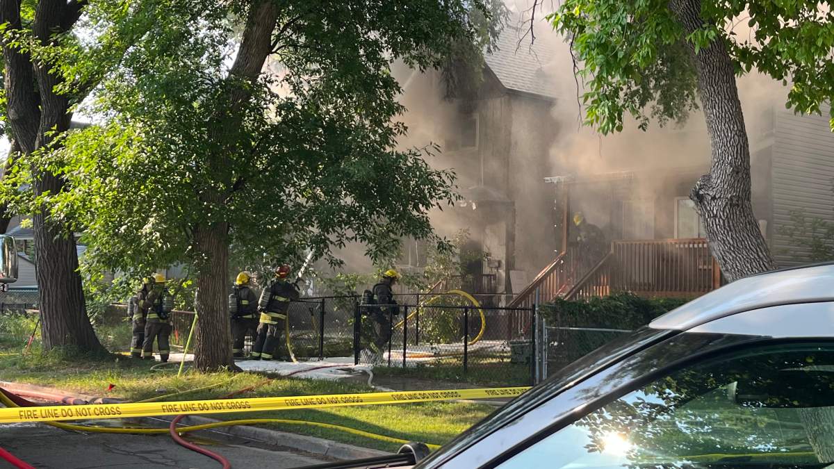 Winnipeg firefighters battle a blaze on Elgin Avenue Wednesday morning.