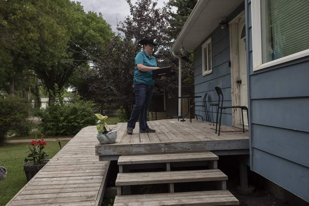 Independent candidate Bonnie Critchley campaigns in the riding of Battle River-Crowfoot, where Pierre Poilievre is attempting to earn a seat in Camrose, Alta., on Tuesday July 22, 2025.