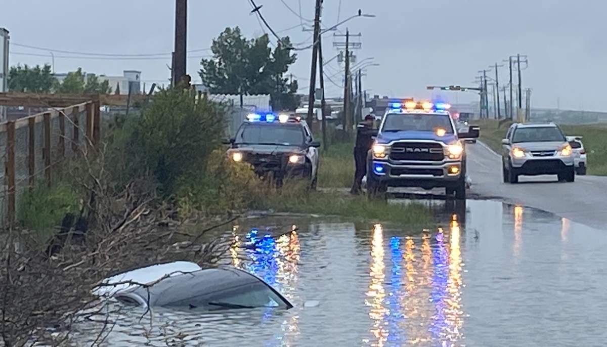 Calgary police are investigating after this car ended up submerged in a waterlogged ditch on Monday morning. There was nobody inside when emergency crews arrived.