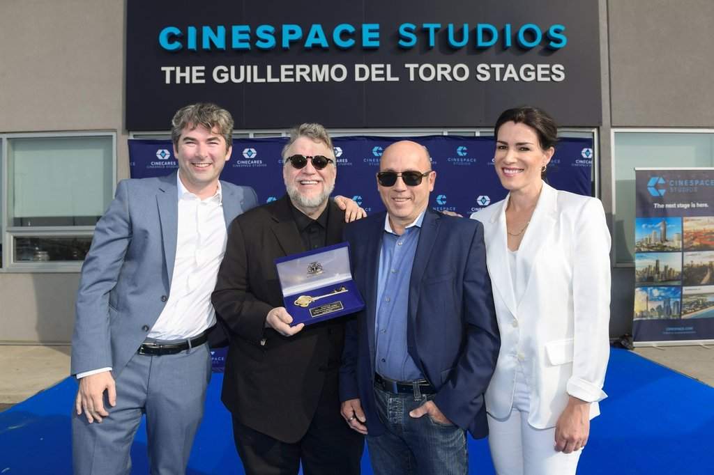 Eoin Egan (Cinespace Studios), left to right, Guillermo del Toro, Miles Dale, Magali Simard (Cinespace Studios) are seen in this handout photo, at Cinespace Studios Marine Terminal Campus near Toronto’s waterfront, after del Toro received a key to the city from Toronto Mayor Olivia Chow on Thursday, July 24, 2025. THE CANADIAN PRESS/Handout - Sam Santos for Cinespace Studios (Mandatory Credit).