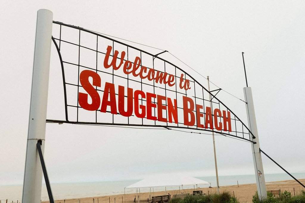 The newly updated "Welcome to Saugeen Beach" sign sits on the western-most portion of South Bruce Peninsula's main street, where the stretch of sand meets the dead-end road, as shown on Tuesday, July 1, 2025.   