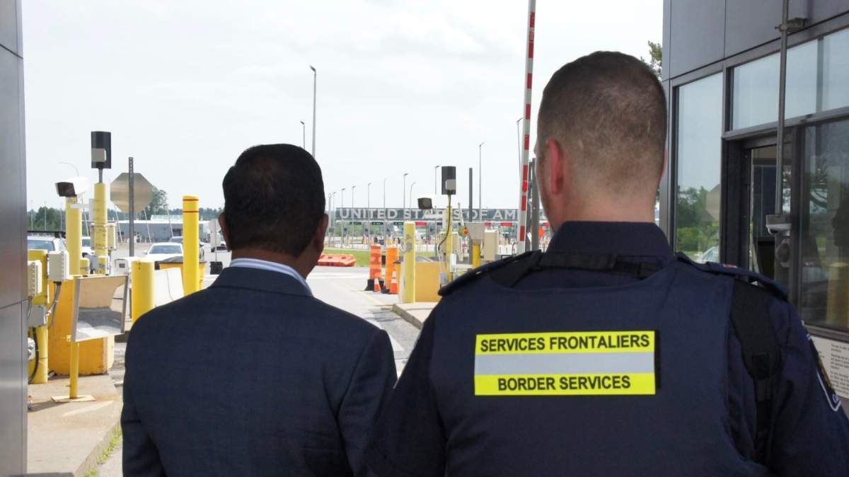 In photo posted on his X account, Public Safety Minister Gary Anandasangaree looks at U.S. border with CBSA officer.