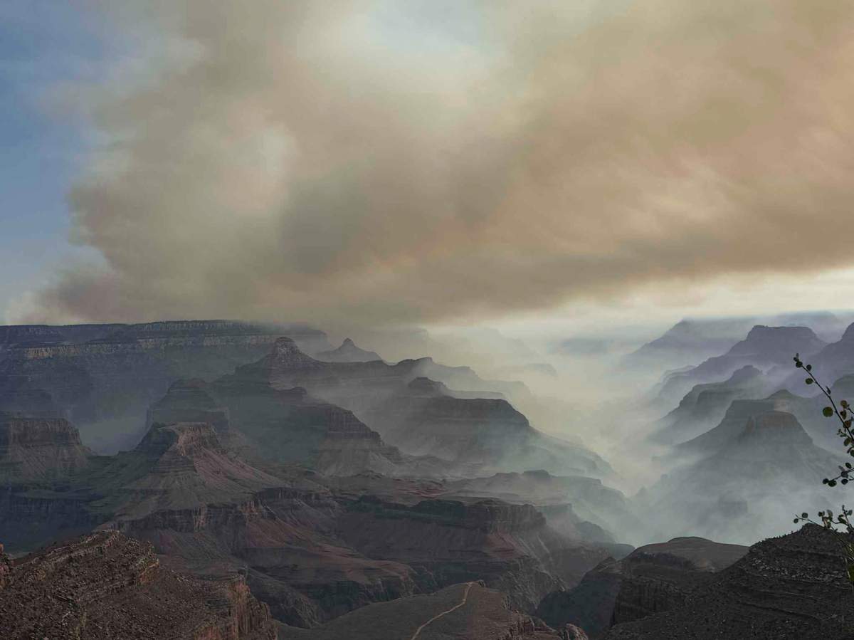 This photo provided by Caren Carney shows the family’s view of fires over the Grand Canyon after they had to evacuate Grand Canyon Lodge, a historic lodge on the North Rim, in northern Arizona, Thursday, July 10, 2025.