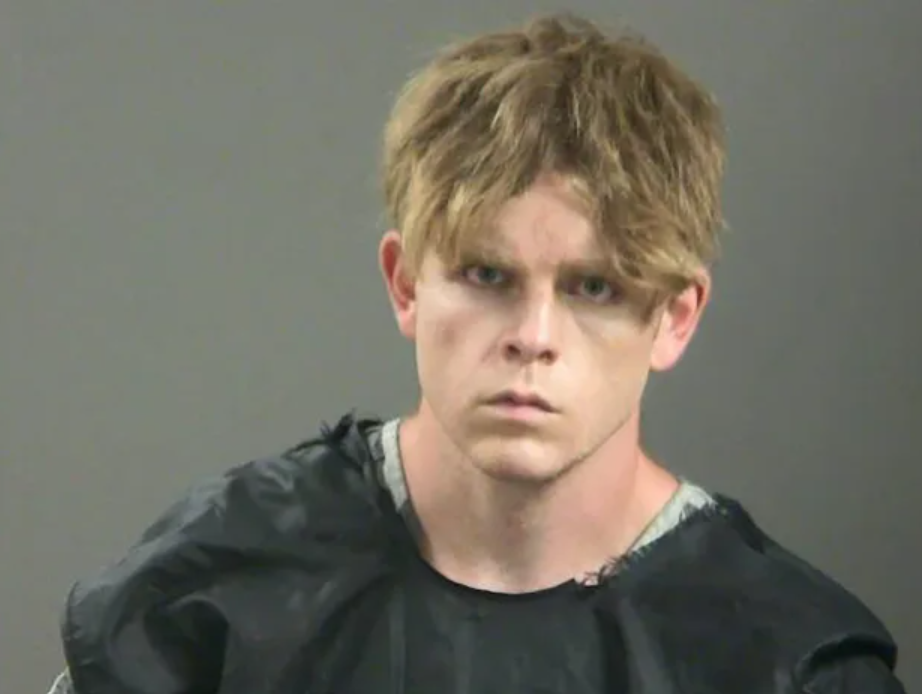 Andrew James McGann, 28, was arrested in connection with the deaths of married couple Clinton David Brink, 43, and Cristen Amanda Brink, 41.