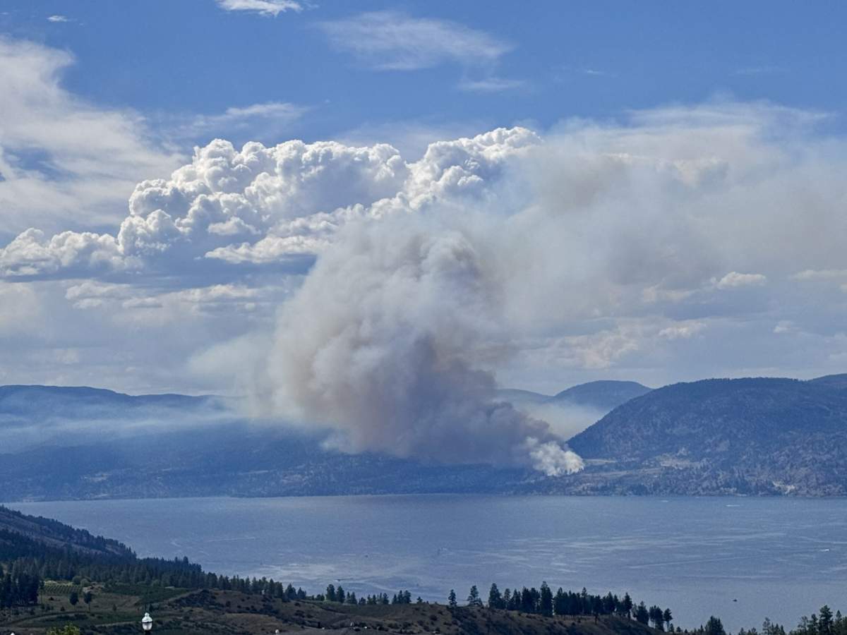 Smoke rises from a wildfire near Peachland, B.C. on July 30, 2025.