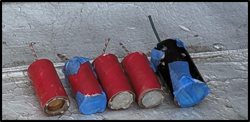 Five improvised explosive devices allegedly manufactured by Michael Gann, 55, are pictured where U.S. prosecutors say they were found on a rooftop in Manhattan on June 5, 2025.
