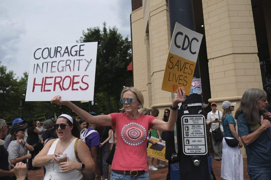 Workers and supporters gather to rally for the departing scientific leaders at the Centers for Disease Control and Prevention outside the CDC headquarters, Thursday, Aug. 28, 2025, in Atlanta.