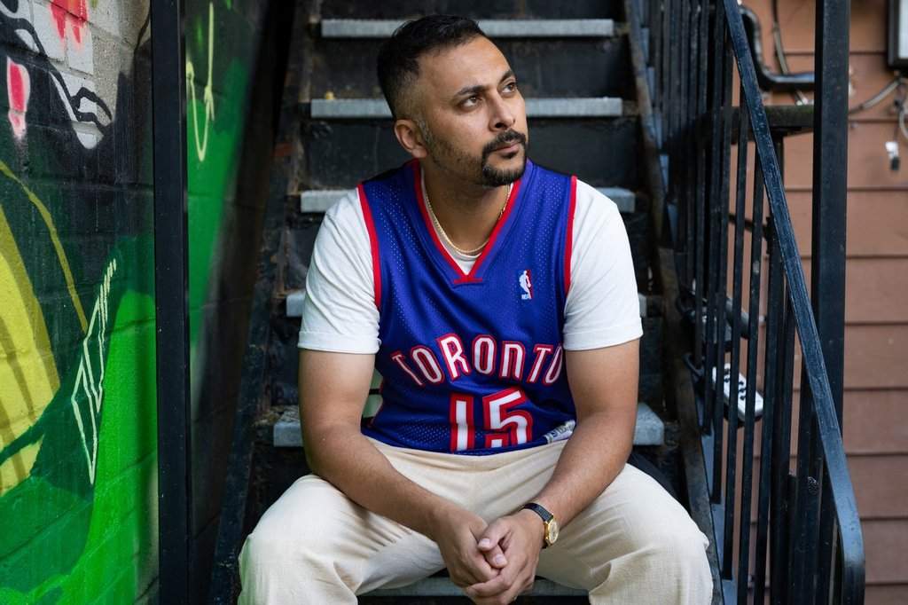 Amar Wala, director of the film "Shook," poses for a portrait at Rooms Coffee in Toronto, on Tuesday, July 22, 2025. THE CANADIAN PRESS/Arlyn McAdorey.