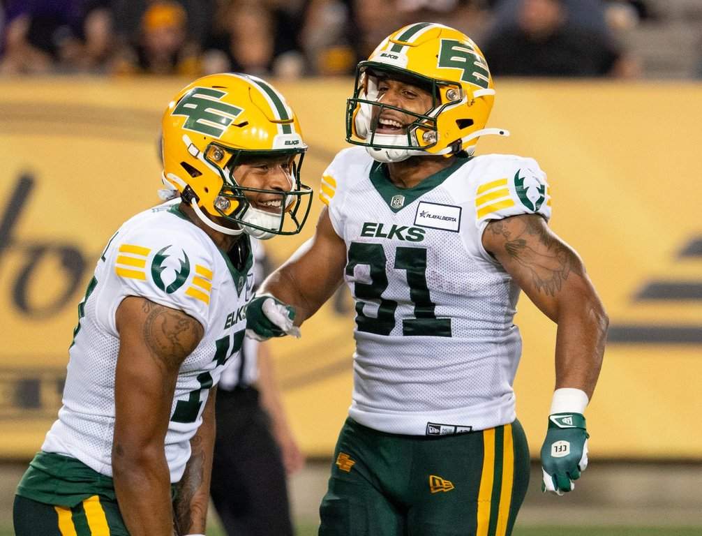 Edmonton Elks running back Justin Rankin (31) celebrates his touchdown with wide receiver Dillon Mitchell (17) during second half CFL football game action in Hamilton, Ont. on Saturday, August 17, 2024. 