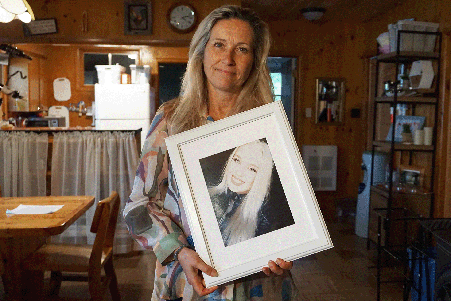 Connie Lester holds a portrait of her late daughter, Cally.