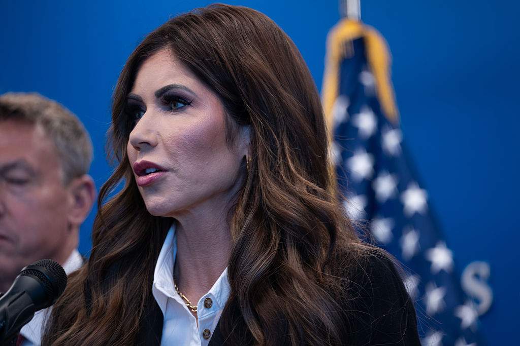 Homeland Security Secretary Kristi Noem speaks at a news conference in New York following the weekend shooting of an off-duty Customs and Border Protection officer by an illegal migrant on July 21, 2025 in New York City.
