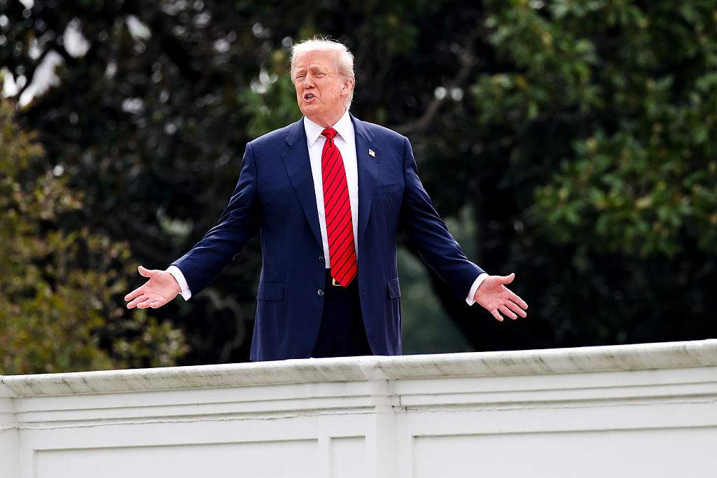 U.S. President Donald Trump on the roof of the West Wing of the White House in Washington, D.C., on Tuesday, Aug. 5, 2025. Trump appeared on the roof of the White House near where he has proposed a new ballroom to be built.