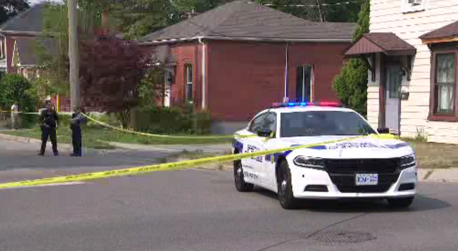 Police block of the scene after a fight saw one person die and two others injured.