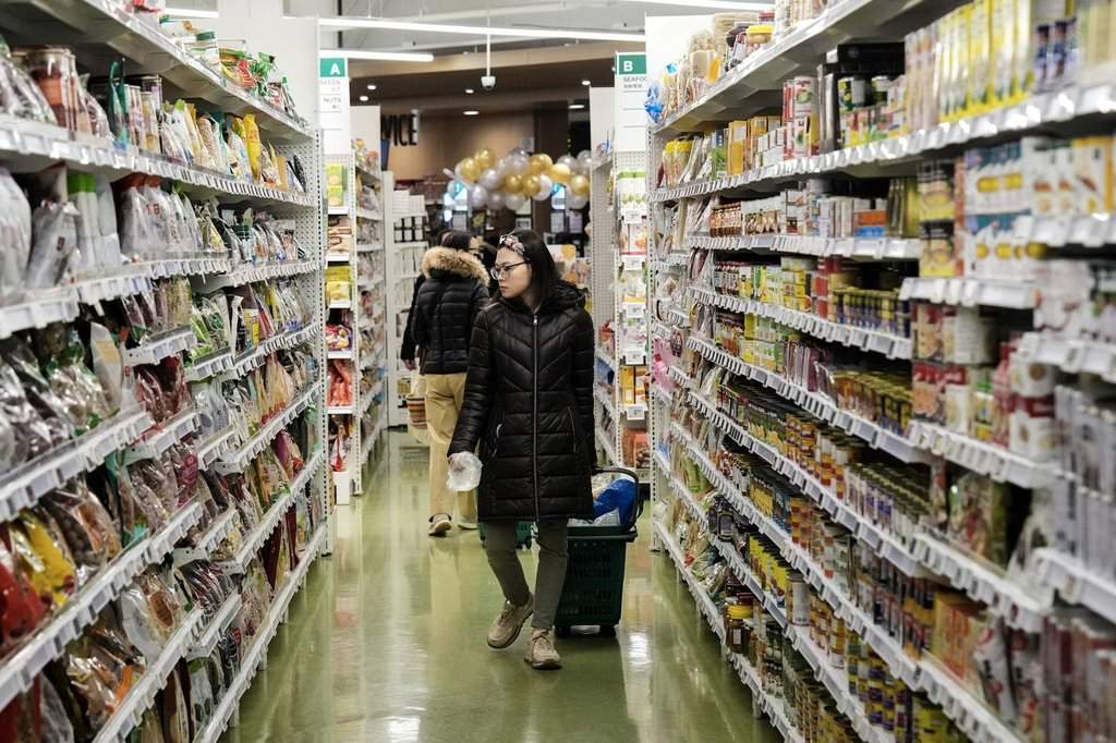 A customer shops at T&T Supermarket's location in Toronto's Fairview Mall, Friday, Nov. 28, 2024. THE CANADIAN PRESS/Chris Young.