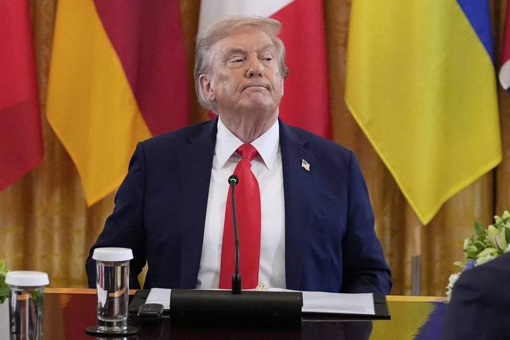 President Donald Trump participates in a meeting with Ukrainian President Volodymyr Zelenskyy and European leaders in the East Room of the White House, Monday, Aug. 18, 2025, in Washington.